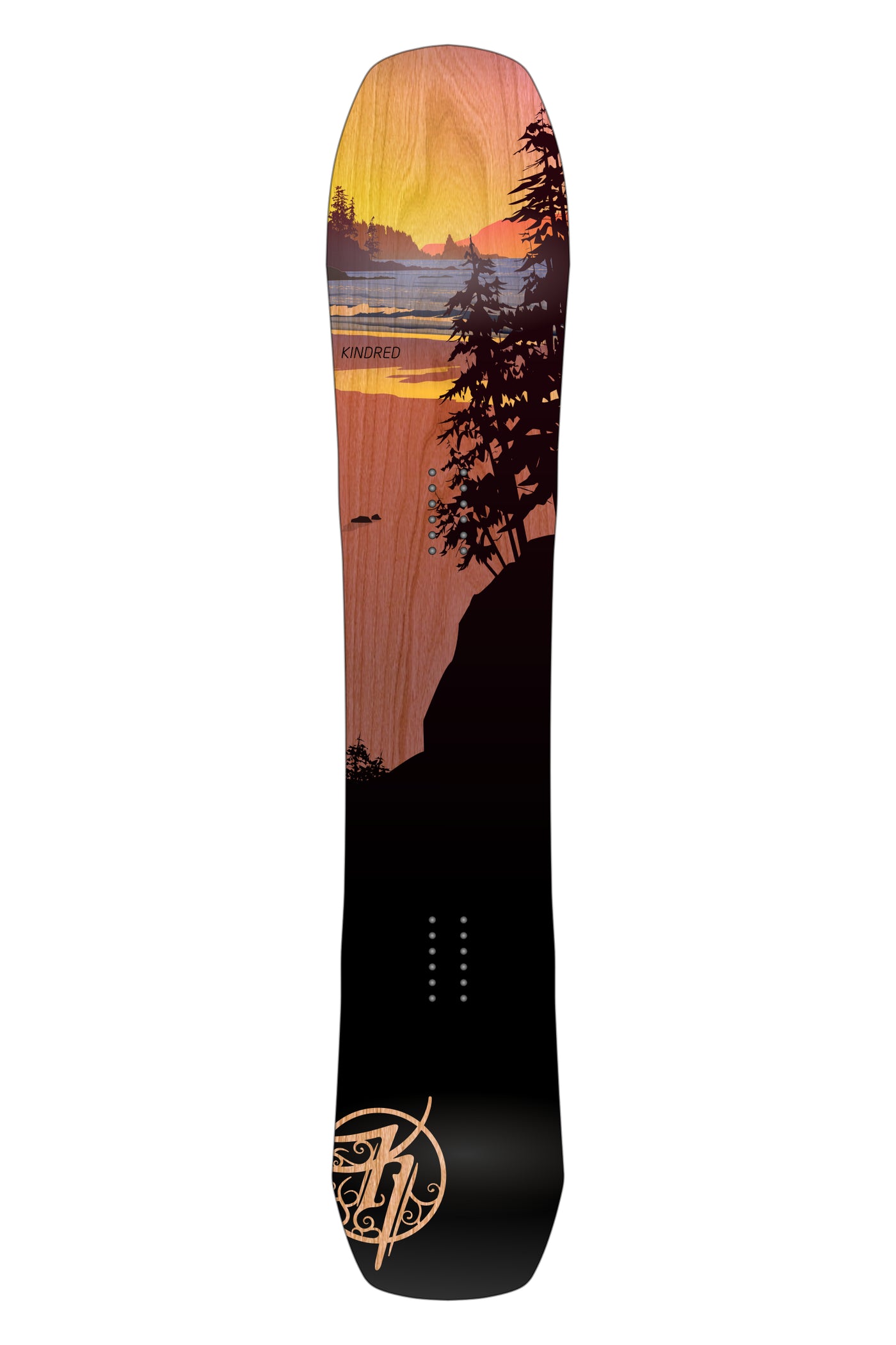 Kindred Ukee snowboard shape, an aggressive all mountain shape. Topsheet artwork shows a colourful Vancouver Island sunset with dark conifers in the foreground. Woodgrain is visible through the transparent colours.